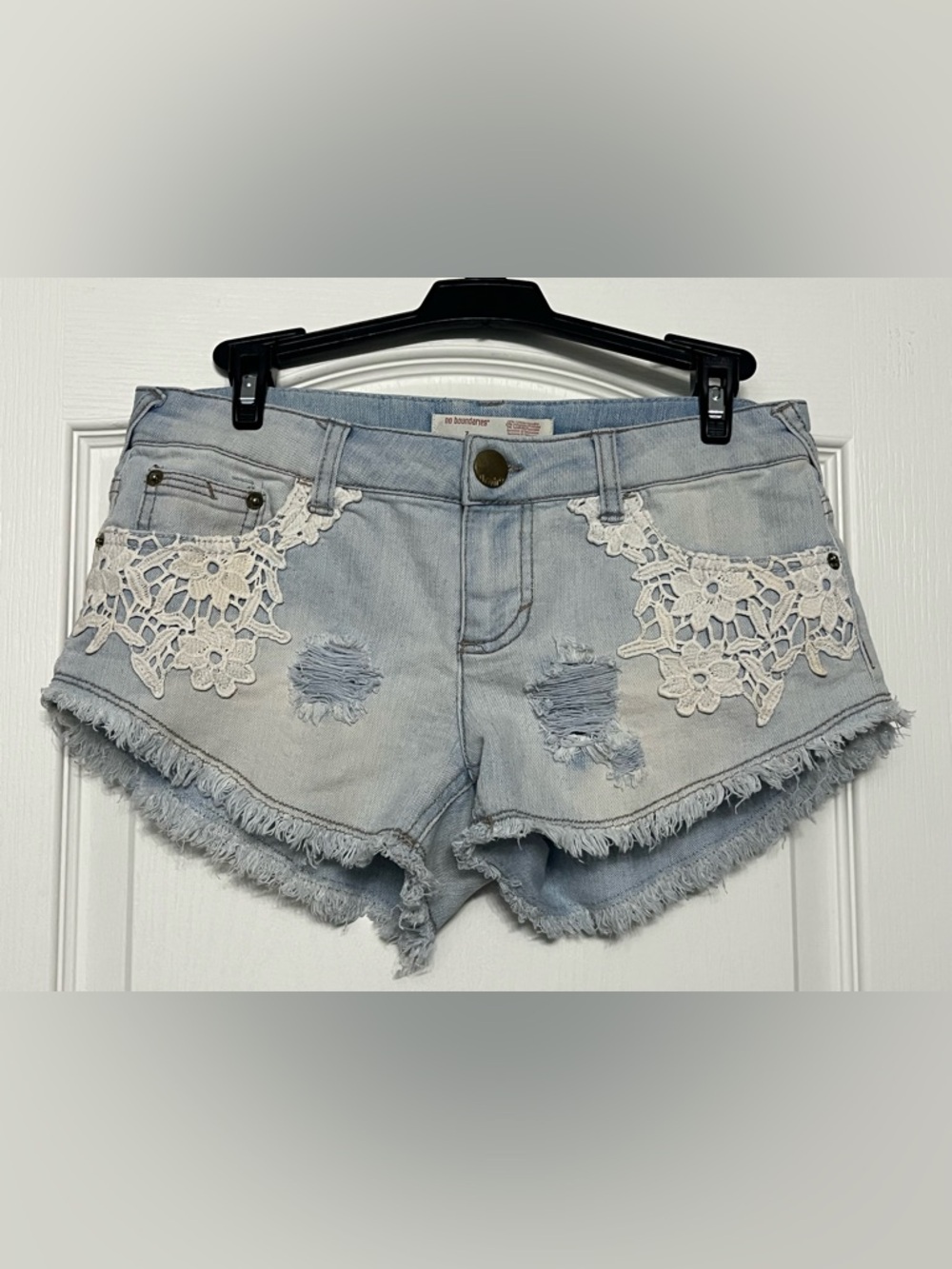 No Boundaries Light Blue Distressed Denim Shorts with White Lace Accents
